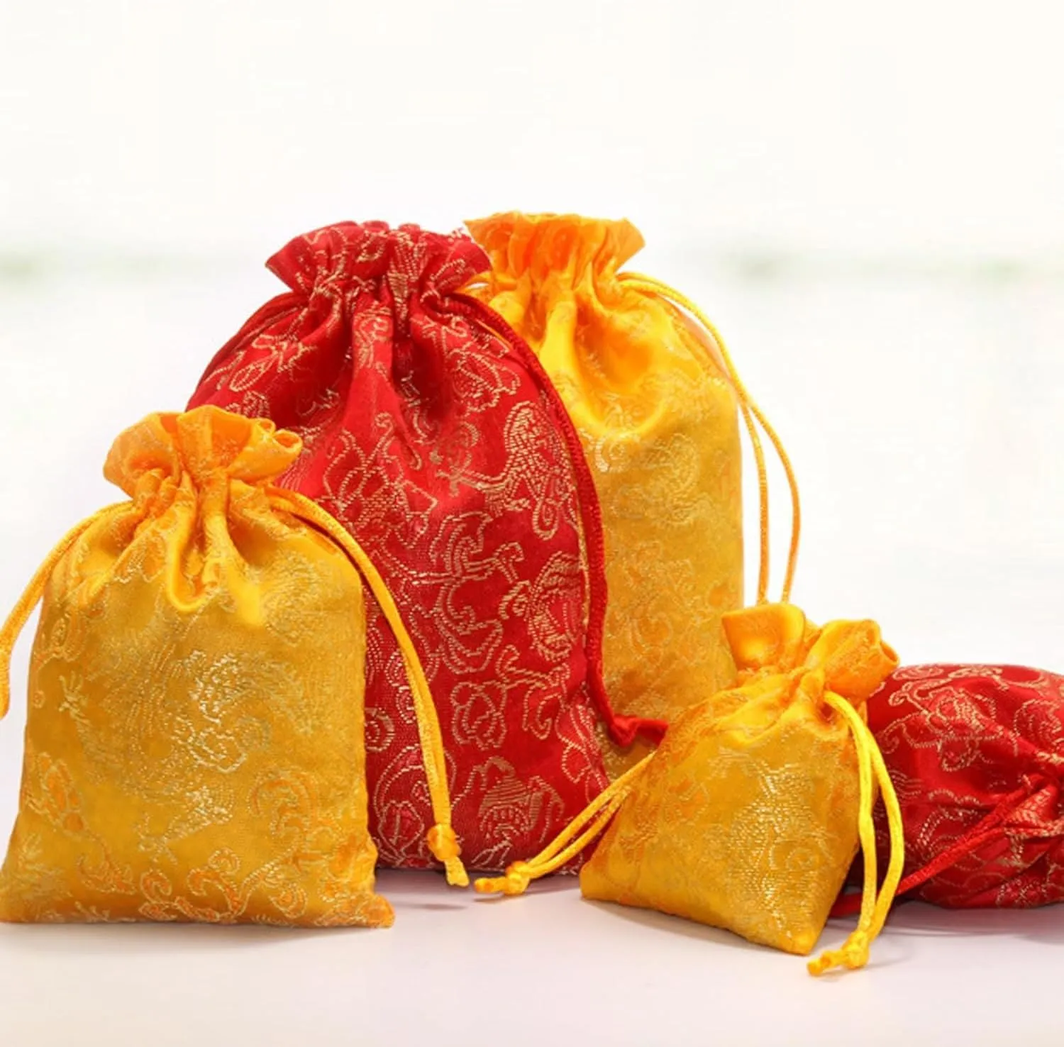 NDCNCQ 20Pcs Drawstring Gift Bags Chinese Lunar New Year Gift Bags Brocade Jewelry Pouch Bags for Jewelry Candy Good Luck Gift (Yellow,13x18cm/5.1x7.1inch)