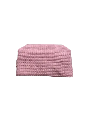 small pink monogrammed makeup bag